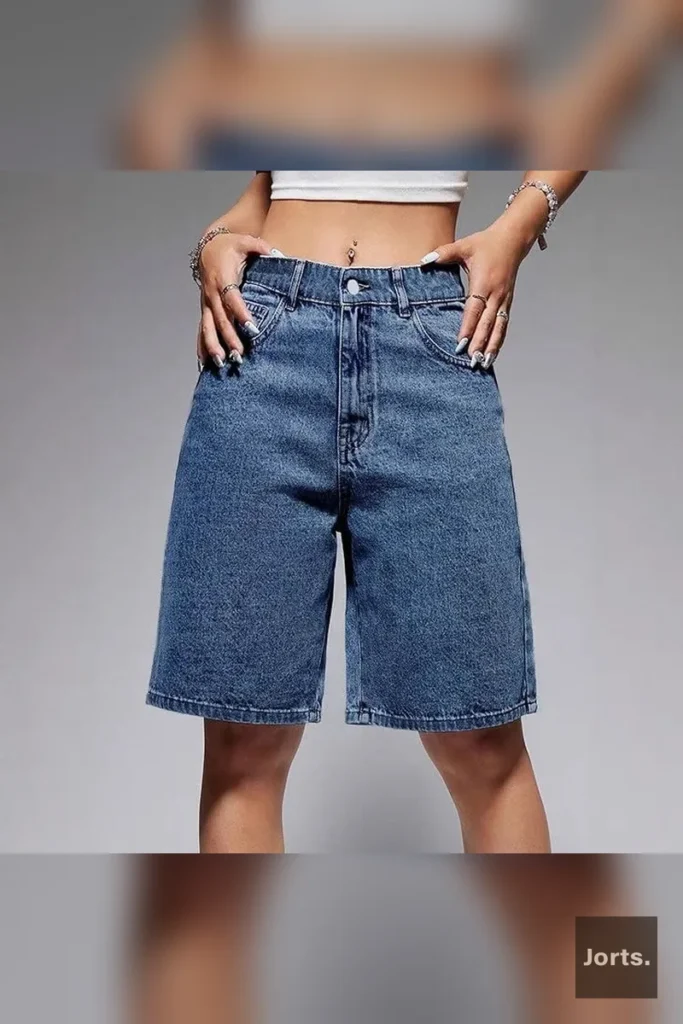 Black baggy cropped denim jorts with subtle cat whisker details.