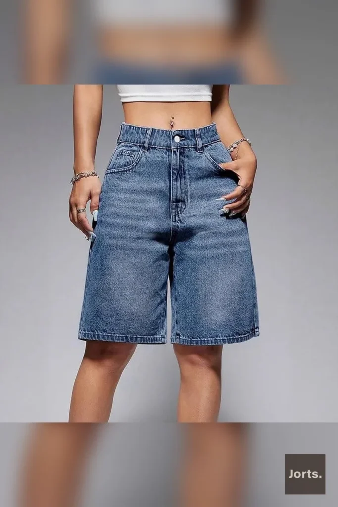 Blue baggy cropped denim jorts with subtle cat whisker details.