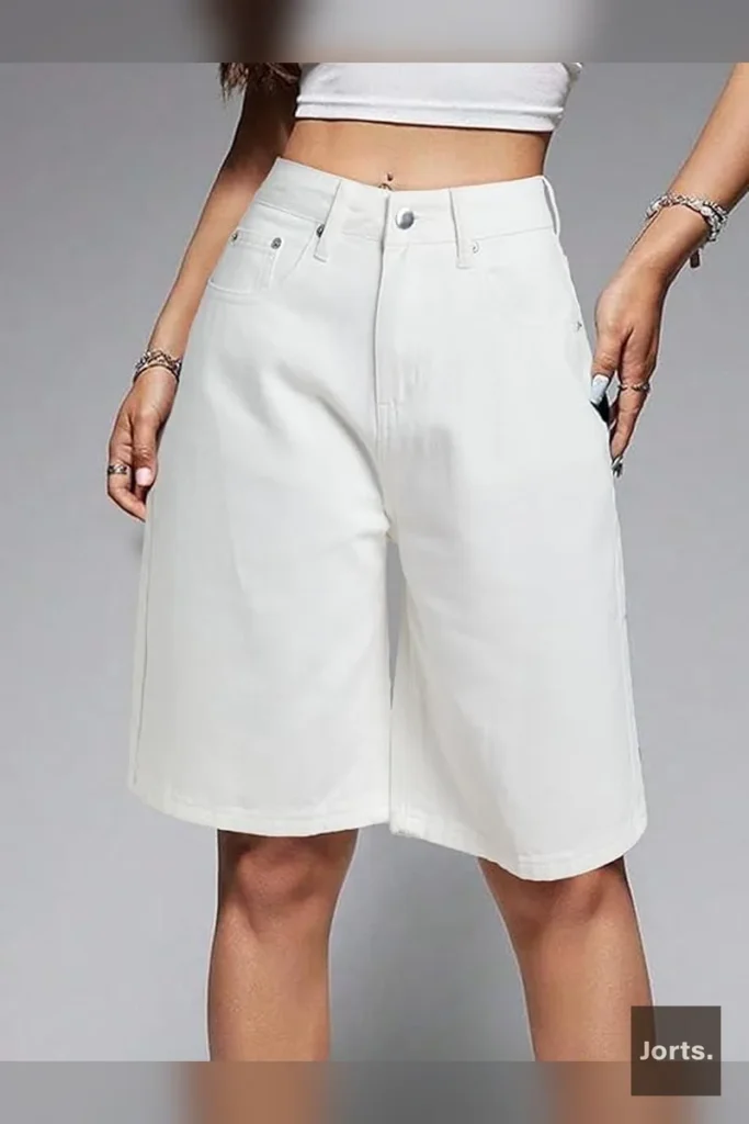 Back view of baggy cropped denim jorts with mid-waist detail.