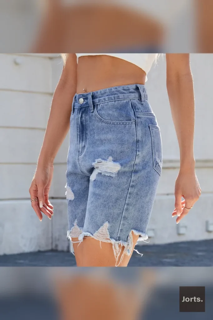 Woman walking in distressed cropped jorts, capturing the essence of street fashion and Y2K nostalgia.