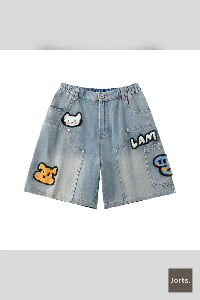 Men's loose fit embroidered workwear denim shorts with appliqué detail and pockets, front view for Y2K street style.