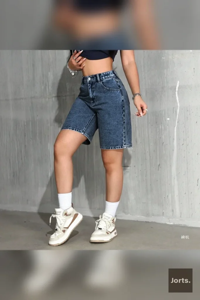 Model showcasing the high-waisted patterned capri pants, highlighting the cropped length and wide-leg design.