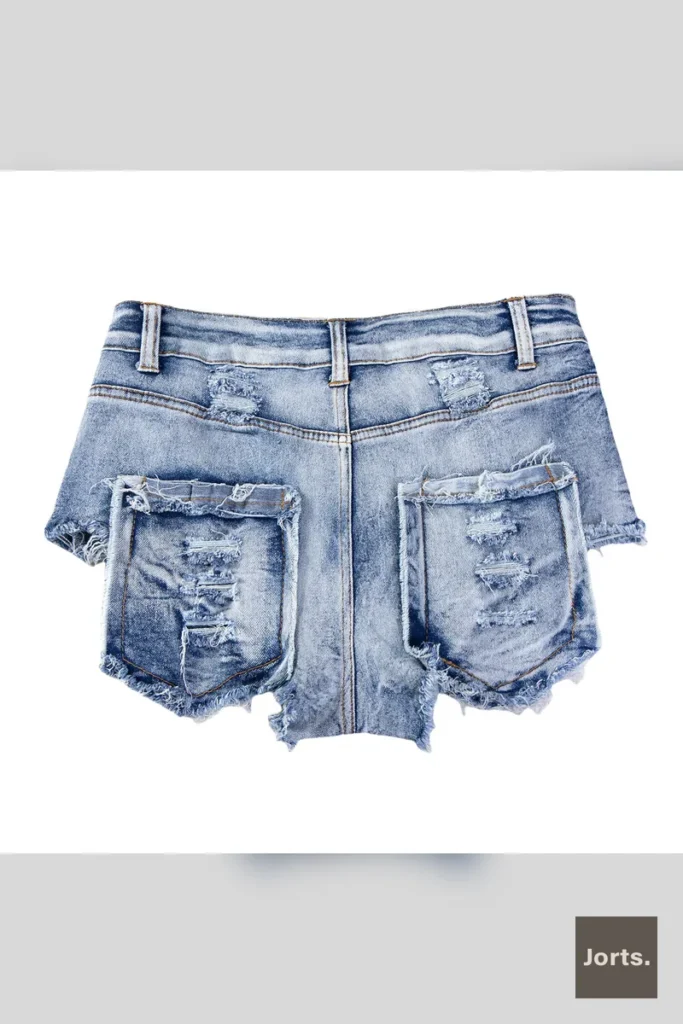 Back view of Iconic Women's Light Blue High-Waist Skinny Raw-Edge Denim Shorts, showing pockets.