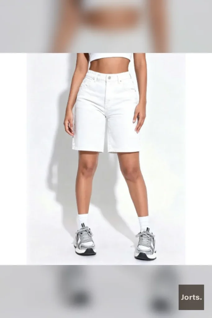 Light blue patterned high-waisted capri pants styled in a full Y2K outfit, perfect for a throwback look.