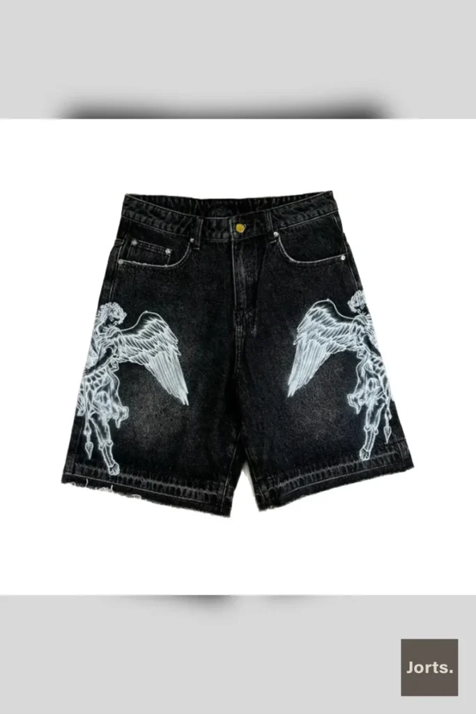 Close-up detail of the graphic print and cotton fabric texture on the Jorts Retro Baggy Printed Cropped Denim Jorts.