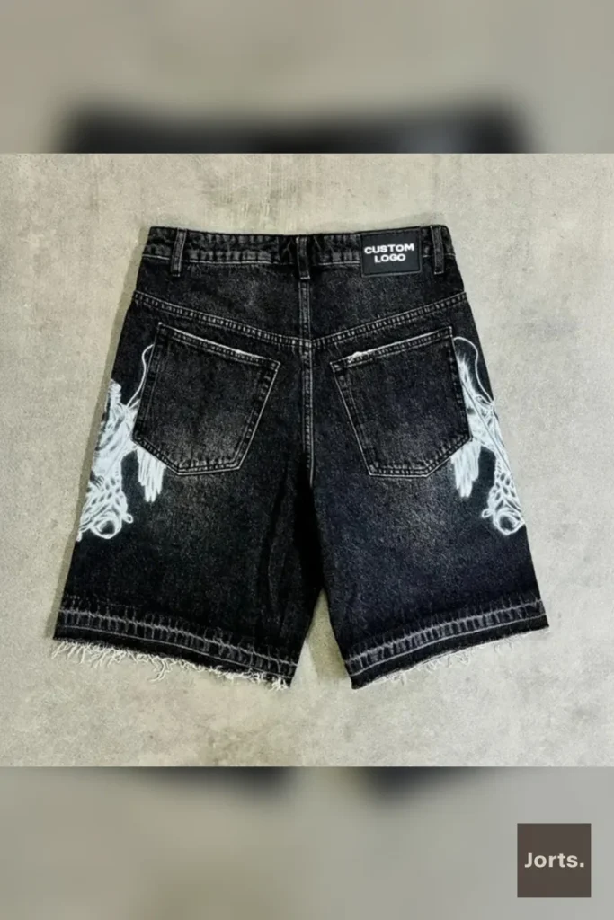 Side profile of model in Jorts Retro Baggy Printed Graphic Cropped Denim Jorts, showing the straight-leg cut.