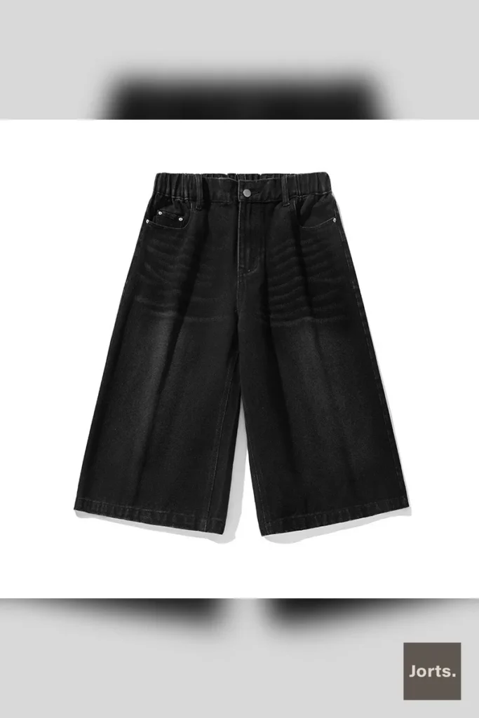 Side view of model wearing black loose capri shorts, highlighting the relaxed fit and middle waist.