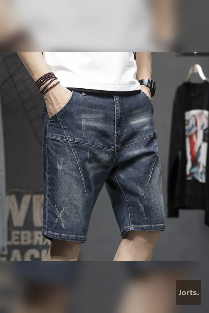 Back view of men's retro hand-painted denim jorts, showcasing unique design and straight fit.