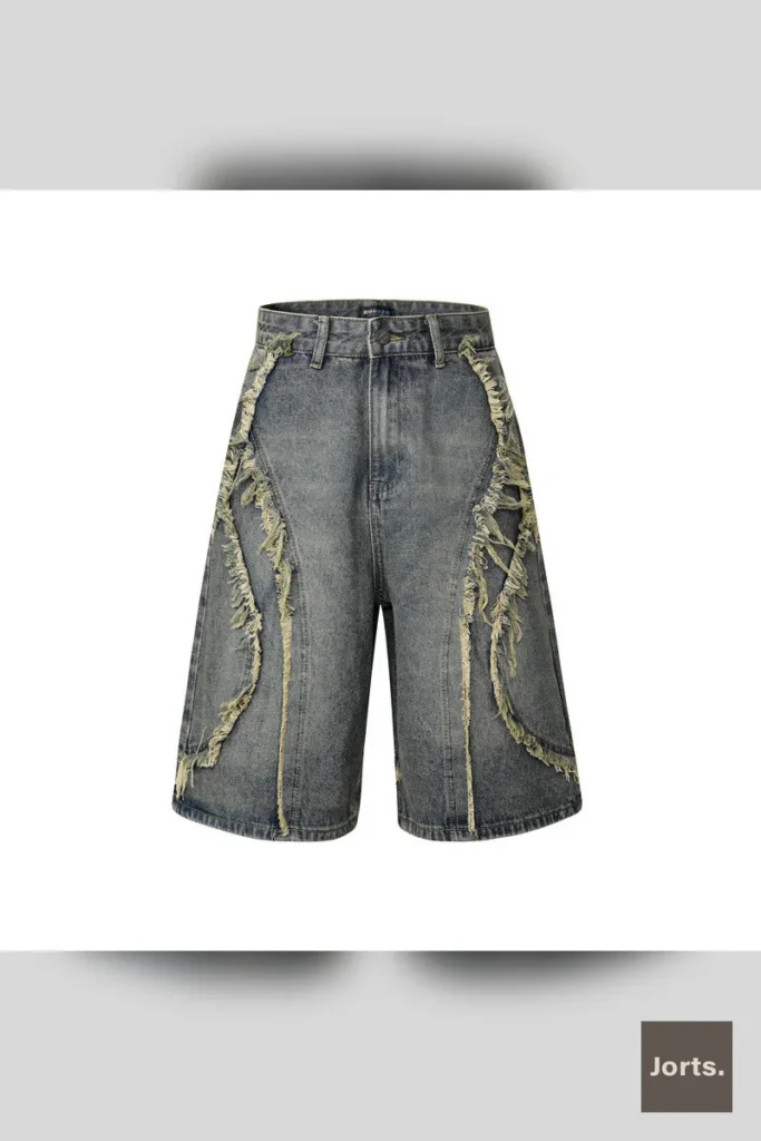 Close-up view of the multi-pocket design on the straight-leg denim pants, showing stitching and button fly.