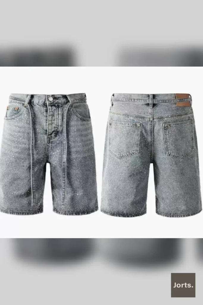 Texture shot of the slight stretch denim fabric used in the rhinestone jorts, highlighting its quality and durability.