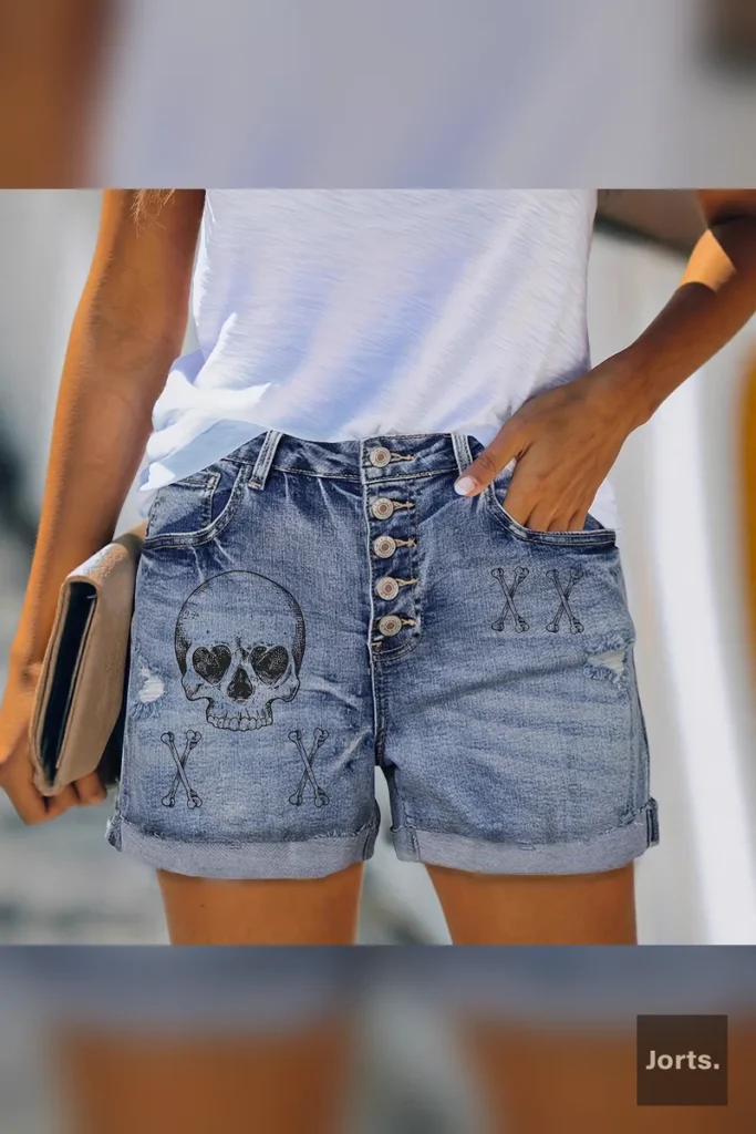 Side profile of model in vintage high waist blue printed denim shorts, highlighting the moderate stretch and Y2K style