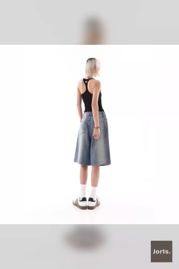 Back view of Y2K baggy denim shorts on a model, blue wash
