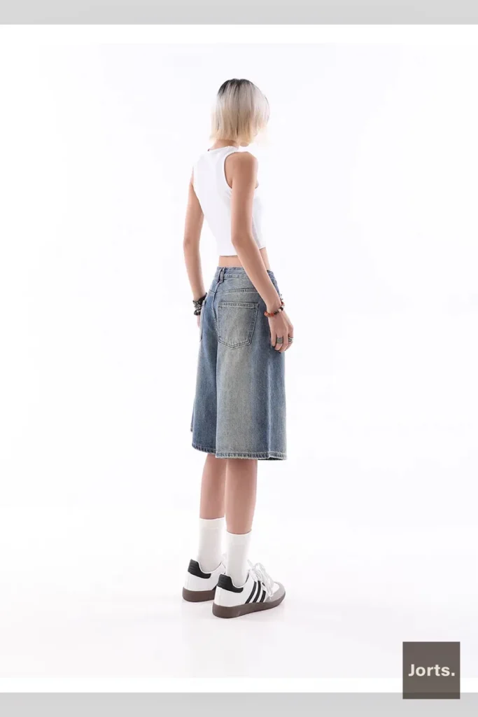 Y2K baggy denim shorts worn with casual top