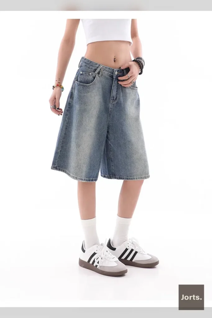 Woman in Y2K baggy denim shorts, streetwear style
