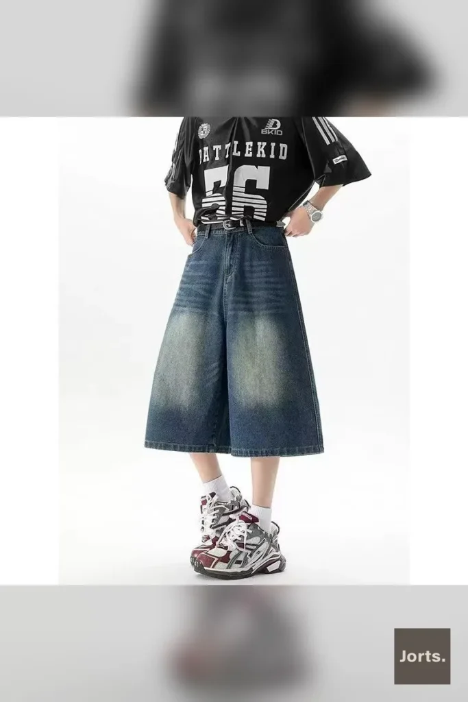 Front view of vintage blue high-waist cropped baggy jorts, featuring the trendy washed look and relaxed fit.