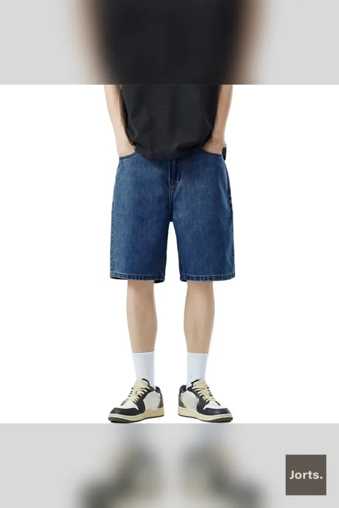 Model wearing light blue Y2K baggy denim shorts with a straight leg fit, front view, capturing throwback streetwear style.