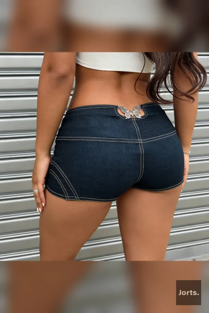 Woman wearing blue low-rise butterfly hot pants, front view