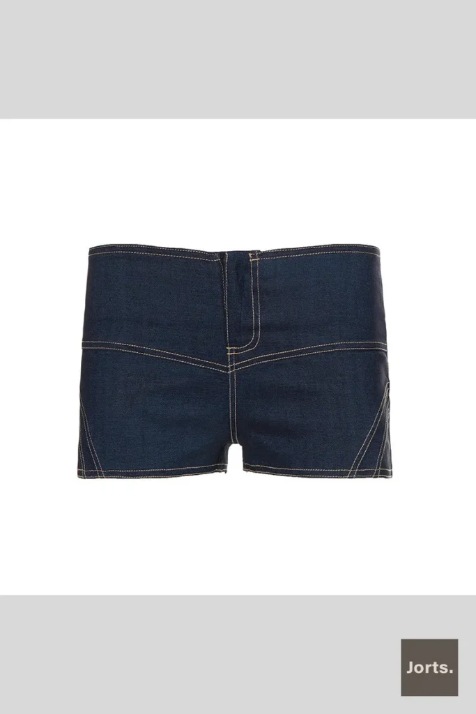 Woman wearing blue low-rise butterfly hot pants, side view