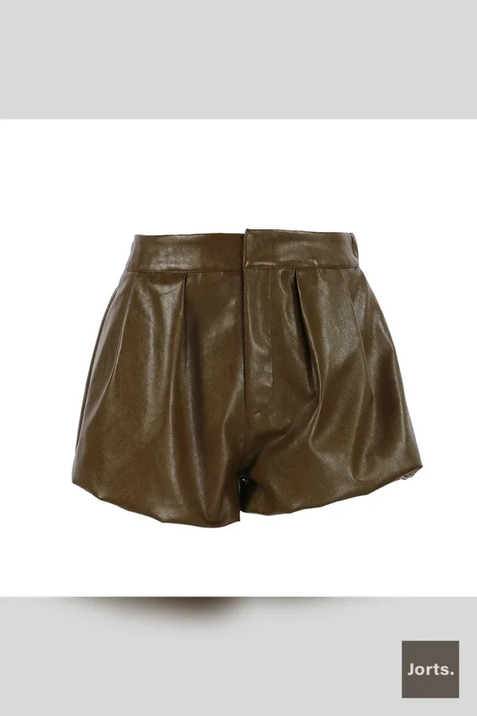 Back view of the women's Y2K faux leather shorts, solid color design and fit.