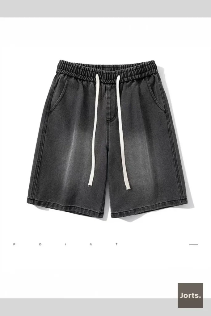 Model in light blue Y2K washed straight-leg jorts, high-waist, front view